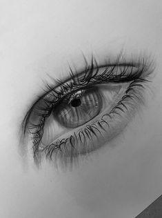 a drawing of an eye with long eyelashes