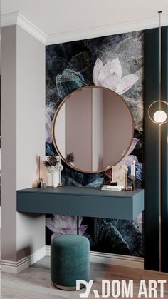 a vanity with a mirror and stool in front of a flower wallpapered wall