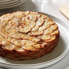 there is a cake that has been sliced into slices on the plate and ready to be served