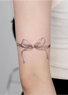 Ribbon Bracelet Tattoo, Bow Bracelet Tattoo, Ribbon Arm Tattoo, Simple Ribbon Tattoo, Ribbon With Flowers Tattoo, Thigh Ribbon Tattoo, Knee Bow Tattoo, Bow Garter Tattoo, Bow Tattoo Back Of Arm