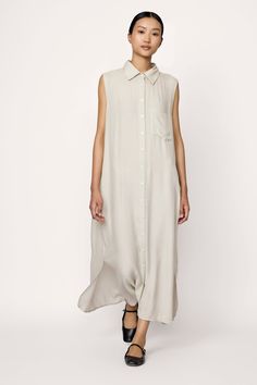 Effortless yet refined, our sleeveless shirt dress is perfect for everyday wear. Crafted from Japanese moss crepe, it offers a relaxed fit with an elevated finish. This versatile piece features a playful pocket, optional belt and inseam pockets for convenience. A truly timeless design. Made with 100% Japanese moss crepeHandmade in IndiaMachine wash cold, lay flat to dry, warm iron as needed. Honoring Earth + Maker Our wovens are handcrafted in India, preserving age-old textile traditions. Made i Classic Sleeveless Dress With Pockets, Sleeveless Shirt Dress With Pockets For Spring, Chic Rayon Shirt Dress For Daywear, Sleeveless Summer Shirt Dress With Pockets, Sleeveless Linen Maxi Dress For Work, Chic Sleeveless Shirt Dress For Daywear, Sleeveless Shirt Dress With Pockets For Daywear, Chic Sleeveless Shirt Dress With Pockets, Classic Sleeveless Shirt Dress For Work