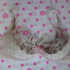 Victoria's Secret Dream Angels Bra 34C embroidered Victoria's Secret Dream Angels Balconet embroidered lace. 34C.  I'm not sure what color this is. Please refer to photos. Brand new with tag. All Victoria's Secret items are available until March 15th Victoria's Secret Intimates & Sleepwear Bras Pink Feminine Bra For Wedding, Fitted Pink Bra For Wedding, Pink Feminine Wedding Bra, Pink Lace Trim Bra For Wedding, Wedding Bra With Pink Lace Trim, Wedding Bra With Lace Trim In Pink, Pink Lace Trim Wedding Bra, Visual Archive, Princess And The Pea