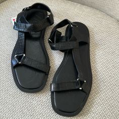 New Black Zara Sandals Size 10.5 Zara Black Sandals For Vacation, Zara Black Sandals With Buckle Closure, Zara Black Sandals With Round Toe, Zara Black Flat Heel Sandals, Zara Black Leather Sandals, Zara Strappy, Womens Biker Boots, Black And White Flats, Feather Sandals