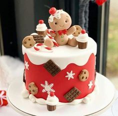 there is a cake decorated with teddy bears on the top and snowflakes around it