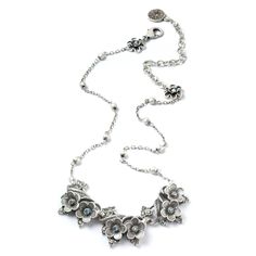 Entrance yourself in this whimsical floral necklace. An everyday jewelry piece with the perfect size of minimalistic flowers. Dress up or down. Give your ensemble a hint of southwest boho style. Burnished silver. Made in USA. Shop matching earrings: https://www.etsy.com/listing/729484285/silver-earrings-flower-earrings-silver Shop jewelry set: https://www.etsy.com/listing/729486223/flower-jewelry-set-flower-necklace Silver Delicate Flower Charm Necklace, Delicate Silver Flower Charm Necklace, Delicate Silver Flower Necklace For Anniversary, Forget Me Not Flower, Silver Flower Necklace, Silver Flower Earrings, Iridescent Crystal, Necklace Flower, Tiny Earrings