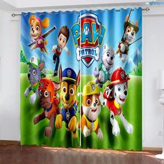 the curtain is decorated with cartoon characters on it and has an image of paw patrol