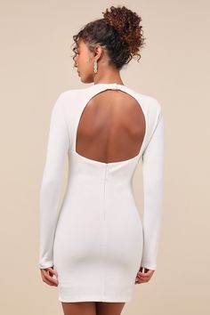 Dreams do come true with the Lulus All That You Wish For White Mock Neck Cutout Bodycon Dress! Medium-weight, stretch-knit falls from a mock neck, into fitted long sleeves. A seamed, bodycon silhouette leads into a mini skirt, while a flirty back cutout (with top button closure) completes this party-ready look! Hidden back zipper/clasp. Fit: This garment fits true to size. Length: Above mid-thigh. Size medium measures 33" from shoulder to hem. Bust: Great for any cup size. Waist: Fitted - very f White Cutout Bodycon Dress For Night Out, Spring White Cutout Bodycon Dress, White Stretch Dress With Hollow Out Details, White Stretch Mini Dress With Cutout, White Fitted Cutout Bodycon Dress, Cutout Bodycon Dress, White Mock Neck, Mock Neck Bodycon Dress, White Homecoming Dresses