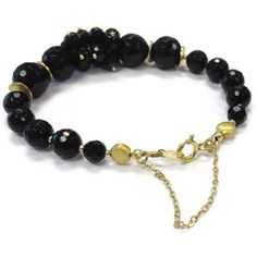 This black onyx bracelet created by Jewelry By CARMAL is made of black onyx faceted gemstones, vermeil beads, 14k gold filled: chain, findings and spring ring clasp closure. The bracelet measures 7 1/2 inches in length. View more beaded bracelets: http://www.etsy.com/shop/jewelrybycarmal?section_id=8002918 WE OFFER FREE STANDARD SHIPPING WITHIN THE UNITED STATES. All of our jewelry is unique and custom designed. We would love to assist you with any custom orders or needs for special occasions! W Elegant Onyx Beaded Bracelets With Black Beads, Elegant Onyx Jewelry With Polished Beads, Elegant Black Rosary Bracelet, Black Gemstone Beads Bracelets For Jewelry Making, Onyx Bracelets With Natural Stones, Onyx Natural Stones Bracelets, Elegant Onyx Beaded Bracelets With Natural Stones, Elegant Onyx Beaded Bracelets With Gemstone Beads, Elegant Black Bracelets With Faceted Beads