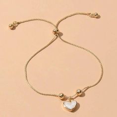 Heart Charm Bracelet Yellow Gold Casual Valentine's Day Jewelry Bracelet, Casual Everyday Jewelry With Heart Charm, Casual Heart-shaped Jewelry, Casual Heart Charm Bracelet For Valentine's Day, Casual Heart-shaped Friendship Jewelry, Casual Heart Charm Bracelet For Everyday Wear, Casual Heart Charm Bracelet, Casual Adjustable Heart Charm Bracelet, Casual Gold Bracelet