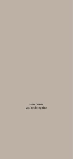 the words slow down, you're doing fine are written in black on a gray background