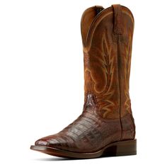 An exotic take on a true classic, this striking boot combines rich caiman belly with extremely intricate detailing along the shaft. Inside, you get TekStep, an extra layer of heel-to-toe cushioning, making it the most comfortable leather-sole boot you've ever worn. Gunslinger Cowboy Boot | Product Features : 0 : ATS® technology provides ergonomic support on uneven terrain, 1 : TekStep provides toe-to-heel cushion for comfort, 2 : Removable Pro Performance insole for cushioning and shock absorpti Western Leather Boots With Crocodile Pattern, Western Style Fitted Work Boots With Reinforced Toe, Fitted Western Work Boots With Reinforced Toe, Classic Fitted Boots For Rodeo, Brown Crocodile Pattern Classic Boots, Classic Snip Toe Boots With Crocodile Pattern, Classic Boots With Crocodile Pattern And Snip Toe, Fitted Work Boots With Reinforced Toe For Western-themed Events, Fitted Work Boots With Reinforced Toe For Western Events