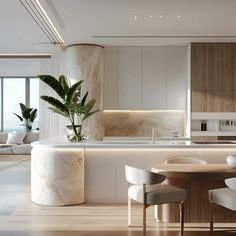 a modern kitchen with marble counter tops and white chairs