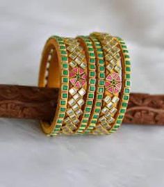 High Quality Stylish Floral look Bangles set for Women, Kadaas can be used individually. All bangles are wrapped with colored silk thread. Outer kadaas have golden work beads on top. our can wear on all Functions, Weddings, Indo-western Ethnic wear and Party wear dresses or Festivals. Keep them away from water and other liquids, No direct Perfumes, deos, water, spray to make it durable. Multicolor Wedding Bangle With Motifs, Multicolor Round Jewelry With Zari Work, Adjustable Zari Work Jewelry For Wedding, Adjustable Zari Work Wedding Jewelry, Multicolor Zari Work Bangle, Adjustable Wedding Jewelry With Zari Work, Multicolor Motif Bangle Jewelry, Adjustable Kundan Jewelry With Zari Work, Green Cutdana Bracelets For Wedding