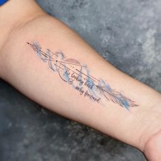 a woman's arm with an arrow and some writing on it that says happy birthday