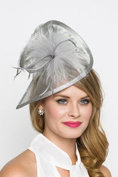 "\"Victoria\" Gray Twist Fascinator Stunning from every angle. This mesh twist fascinator has a look that's both daring and elegant. This statement-making fascinator headband rises to the occasion with a twist mesh base, fluffy bouquet of flighty feathers all on an easy to wear headband with precision placement. This is a modern twist on the loved fascinator. - Light weight - Attached to headband for easy wear - Comes in several other bold colors Shop the skirt and top at www.pippaandpearl.com" Fluffy Bouquet, Grey Fascinator, Derby Attire, Kentucky Derby Style, Edgy Dress, Derby Outfits, Hat Headband, Fascinator Hairstyles, Fascinator Headband