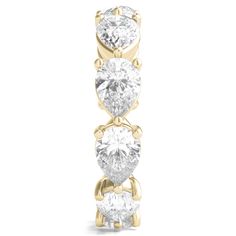 three stone diamond ring in yellow gold