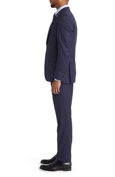 Cut from soft-constructed, stretch-kissed wool, this versatile suit is a staple-in-the-making from the family-owned, tailored-menswear manufacturers. 29 1/2" jacket length (size 40R) Jacket has notched lapels; nonfunctional four-button cuffs Lined 99% wool, 1% elastane Dry clean Made in Canada Wool Suit, Nordstrom, Navy, Wool