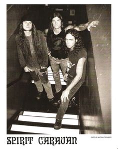 three young men are posing for a photo on an escalator with the caption spirit caravan