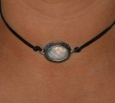 Stunning faux opal and vegan leather choker. Necklace measures 12" and has a 3" extender chain to fit up to a 15" neck. Contact me if you need a larger size. Opal Necklace Simple, Grunge Chokers, Opal Choker, Simple Choker, Face Piercings, Day Collar, Beautiful Chokers, Leather Choker Necklace, Fire Opal Necklace