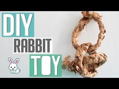 a diy rabbit toy hanging on the side of a wall with text that reads diy rabbit toy