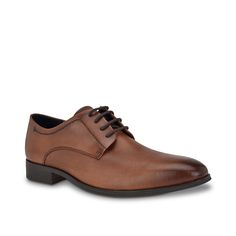 Calvin Klein-Dearl Oxford Exude classic, suave style with the Calvin Klein Dearl oxford. The lace-up displays premium leather upper that's subtly textured for a distinguished appeal. Almond toe front brings an elegant finish. Brown Leather Shoes For Spring Semi-formal, Brown Lace-up Derby Shoes For Business, Classic Lace-up Oxfords For Formal Occasions, Classic Lace-up Leather Shoes For Office, Formal Leather Shoes For Spring, Spring Business Leather Dress Shoes, Brown Lace-up Dress Shoes For Business Casual, Semi-formal Spring Lace-up Shoes With Brogue Detailing, Brown Textured Sole Oxfords For Business