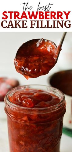 a spoon full of strawberry cake filling on top of a jar with the title above it