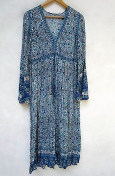 "ITEM DESCRIPTION women rayon maxi dress- with tassels floral print dress-full bell sleeve casual wear dress-long maxi style indian traditional dress Features : Long sleeve, V neck, Long dress Material : rayon crepe Fabric: 100% rayon soft light weight ethnic print fabrics Sleeve Length = 24inch For more sizes & their measurement, please refer our below chart to understand the sizes variations available with us For your size requirement, please mention your size in seller note at the time of Blue Long Maxi Dress For Fall, Bohemian V-neck Rayon Maxi Dress, Blue Floor-length Maxi Dress For Festival, Blue Bohemian Maxi Dress With Boho Print, Hippie Blue V-neck Dress, Blue Bohemian Maxi Dress, Bohemian Maxi Dress With Floral Print In Rayon, Bohemian Rayon Maxi Dress With Floral Print, Blue Printed Long Maxi Dress