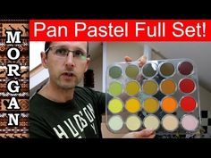 a man is holding up a pan pastel set in front of him with the words'pan pastel full set '