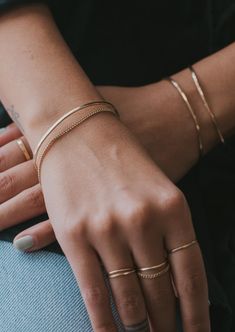 We attached one of our favorite chains to our classic hammered cuff for a 2-in-1 stack and we're obsessed with the outcome. Wire is hammered flat and hand shaped, then lightly hammered for texture. 2.3mm Curb Chain is attached to give a layered cuff and chain look. Available in 14kt Gold Fill + Sterling Silver. Shop our complete Cuff Collection. Handmade in Eau Claire, WI. All of our jewelry is handmade to order so each piece will be unique and may vary slightly from what is pictured. Copper Uses, Everyday Wear Jewelry, Hand Shapes, Silver Shop, Jewelry Cleaner, Jewelry Case, Curb Chain, 14kt Gold, Earring Necklace