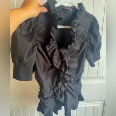 Debbie Shuchat Black Ruffle Shirt Size 14 Black Ruffle On The Front And All The Way Around It Does Run A Little Small But It’s Size 14 Excellent Condition Never Worn But No Tags From Smoke Free / Pet Free Home. Feel Free To Ask Questions Or Make Offers. Bundle Shipping Available A42 Fall Shirt With Ruffles And Short Sleeves, Fall Short Sleeve Shirt With Ruffles, Fall Ruffled Short Sleeve Shirt, Black Casual Top With Ruffled Collar, Black Casual Shirt With Ruffles, Casual Black Shirt With Ruffles, Black Fitted Blouse With Ruffled Collar, Fitted Tops With Ruffled Collar For Night Out, Black Cotton Shirt With Ruffles