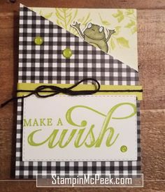 a handmade card with the words make a wish and a green frog on it