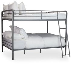 a metal bunk bed with two white pillows on the bottom and one black frame, against a white background