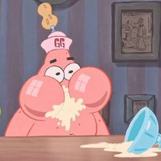 a cartoon character is blowing something out of his mouth while sitting at a table in front of him