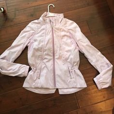 Gorgeous Lilac Lululemon Zip Up Jacket In Brand New Condition. After Baby Just Doesn't Fit. Stunning Color With Very Faint Pattern. Drawstrings Create A Really Flattering Fit. Brand New Stretch Athleisure Outerwear For Spring, White Spring Workout Outerwear, White Outerwear For Spring Workout, Spring Sports Fitted Outerwear, Fitted Athleisure Outerwear For Spring, Spring Nylon Outerwear For Workouts, Fitted Sporty Outerwear For Spring, Spring Athleisure Outerwear For Workout, Lululemon Zip Up Jacket