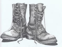 a drawing of two boots with laces on them