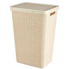 a white wicker laundry hamper with brown trimming on the top and bottom