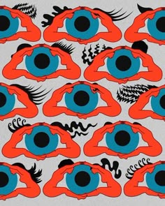 an orange and blue pattern with black circles in the shape of people's eyes