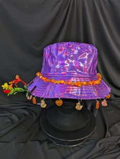 -hat color - purple -bead color - orange -charm color - orange -unisex adult size -inner circumference - 22.5in -crown dip - 3in -brim - 2.25in -NOT machine washable -Perfect for raves and outdoor festivals! Shipping within the US USPS First Class Package 3-9 days USPS Priority Mail 1-5 days USPS Priority Mail Express 1-3 days Shipping International  USPS First Class Mail International  -Varies- USPS Priority Mail International 6-14 days USPS Priority Mail Express International 3-9 days Shipping times are estimated, NOT GUARENTEED.  +International buyers are responsible for all import fees+ +Orders of $50+ may require signature confirmation upon delivery+ Purple And Orange, Bucket Hats, Color Orange, Color Purple, Priority Mail, Sprouts, Orange Color, Apricot, Caps Hats