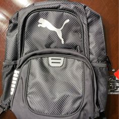 Puma Backpack. Fits A 15" Laptop. Black/Silver. Never Used With Tag Puma Backpack, Backpack Fits, Black Backpack, Black Silver, New Color, Black Gray, Black And Grey, Laptop, Backpacks