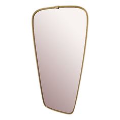 a mirror that is on the wall with a gold frame and metal trim around it