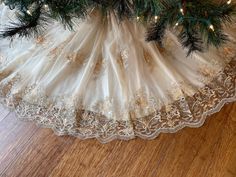 a christmas tree skirt with lights on it