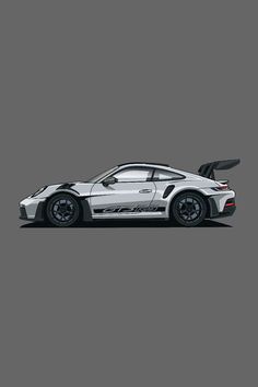 the white sports car is parked in front of a gray background and there is no image to describe