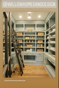 an empty walk in closet with stairs leading up to the second floor and shelves on both sides