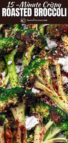 roasted broccoli with red pepper sprinkles and white sauce on top