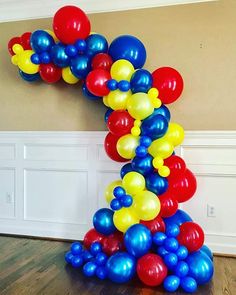 a number one made out of balloons on the floor