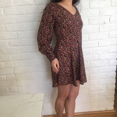 This Is A Darling Floral Dress With A Full Bodied Skirt And A Scoop Neckline. The Silhouette Is 60s-Seque And A Great Way To Add Curves To Your Figure In The Right Places. The Back Neckline Also Is Open And Flattering. Sample Dress From Audrey 3+1one Of A Kind. Casual Mini Hem Lined Dress, Casual Mini Dress With Floral Print, Flirty V-neck Dress With Ditsy Floral Print, Fitted Mini Hem Daywear Dresses, Fitted Long Sleeve Lined Mini Dress, Fitted Long Sleeve Mini Dress With Lining, Casual Lined Mini Dress, Fitted Floral Print A-line Mini Dress, Floral Print Fit And Flare Mini Dress With V-neck