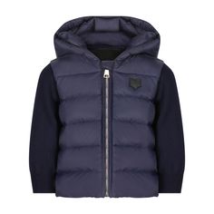 Upgrade your boy's wardrobe with our Navy Jacket with Matching Knit Sleeves, perfect for in-between weather. The classic navy color and cozy knit sleeves provide warmth and style, making it a versatile choice for any occasion. Meticulously crafted for maximum warmth, with an interior filled of down and an exterior made of 100% polyester. Boasts a luxurious high collar and a hood. Elegantly secured with a chrome YKK zipper closure. Features adjustable drawstrings on both sides for customizable sn Childrens Coats, Scotch Bonnet, Hooded Puffer Jacket, Navy Jacket, Boy Accessories, Cool Graphic Tees, Knitted Coat, Knit Sleeve, Cozy Knit