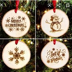 four christmas ornaments hanging from a tree with snowflakes and merry lettering on them