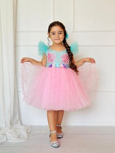 Dive into a magical world with our enchanting girls mermaid dress, perfect for your little mermaid princess! This stunning mermaid girl costume is ideal for Halloween, Christmas, and New Year's celebrations. Whether for a themed birthday party or a special occasion, our mermaid outfit will make your child feel like the star of the sea. Gift your little one an Ariel birthday gift with our toddler Ariel costume, featuring a beautiful mermaid gown. Make every moment a mermaid adventure with this mu Toddler Ariel Costume, Mermaid Princess Dress, Mermaid Hair Bow, Girls Mermaid Party, Ariel Costume, Star Of The Sea, Ariel Costumes, Ariel Birthday, Magical Mermaid