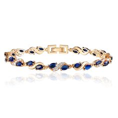 PRICES MAY VARY. Classic Elegant Design: Women's Bracelets are exquisitely cut with emerald Blue sparkling 3A gemstones and cubic zirconia, length 7.48inch/190mm, fashionable and elegant design, suitable for any age and style Highly Quality Material: The 18K gold-plated allergy-free copper bracelet is corrosion-, wear- and tarnish-resistant while possessing hypoallergenic, safe, and secure attributes Best Gift: The leaf bracelet comes with a beautiful box, ideal for birthdays, graduations, anniv Eternity Bracelet, Blue Sapphire Bracelet, 18k Gold Bracelet, Emerald Blue, Gold Armband, Leaf Bracelet, Women's Bracelets, Diamond Tennis Bracelet, Gold Bracelet For Women